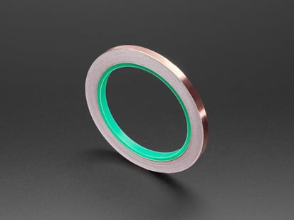 Angled Shot of the Copper Foil Tape with Conductive Adhesive - 6mm x 15 meter roll.