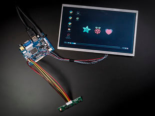 Top down view of a Pixel Qi 10" Display with Controller.