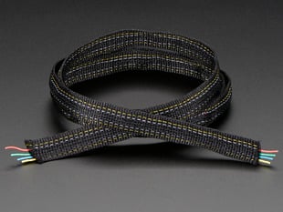 Front view of a tightly coiled Fabric Ribbon 4-Channel Wire.