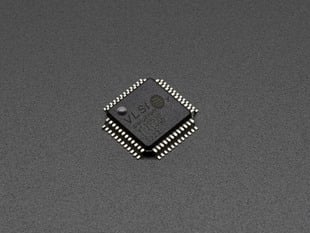 Small, black, square audio codec chip.