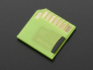 Small, lime-green, shortening microSD adapter.
