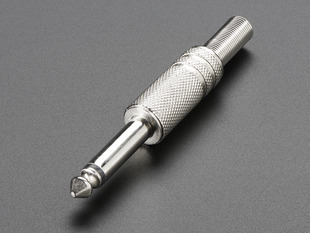 1/4" mono audio plug.