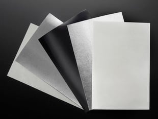 Collection of white, silver and black sheets