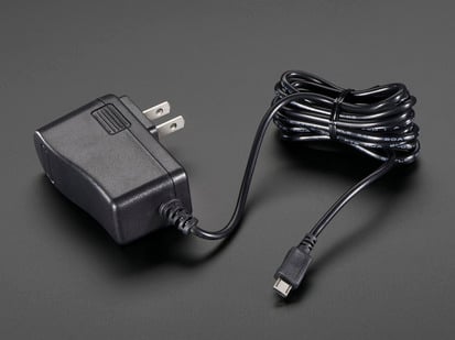 MicroUSB power supply with bundled cable and U.S. plugs.