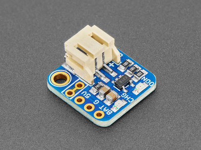 Angled Shot of the Adafruit LiIon/LiPoly Backpack Add-On for Pro Trinket/ItsyBitsy.