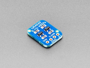 Angled shot of small, blue, rectangular voltage breakout board.