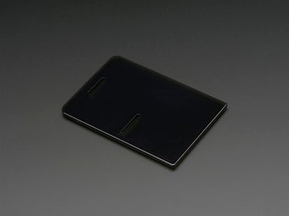 Angled shot of Raspberry Pi Model B+ / Pi 2 / Pi 3 Case Lid - Smoke Gray.