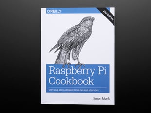 Front cover of technical book "Raspberry Pi Cookbook by Simon Monk - Second Edition". Cover features a black and white illustration of a bird.