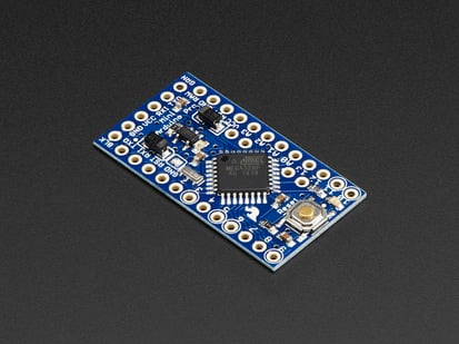 blue, rectangle-shaped Arduino microcontroller.
