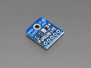 Angled shot of small, blue, square-shaped microphone breakout.