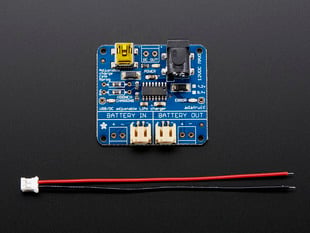 Top view of USB/DC Lithium Polymer battery charger above a 2-pin JST cable.
