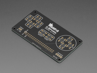 Angled shot of black, rectangular DIY game pad PCB.
