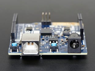 DC barrel jack and USB-B ports on Arduino microcontroller. 