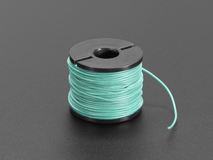 A spool of sea green AWG wire.