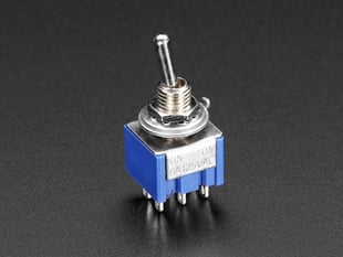 Angled shot of blue, mini, SPDT toggle switch.