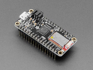 Angled shot of rectangular microcontroller with headers. 