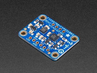Angled shot of a Adafruit Precision NXP 9-DOF Breakout Board. 