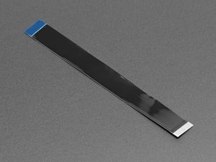 Angled shot of a 10 centimeter long, black, skinny ribbon cable.