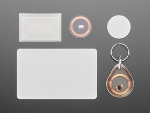 Assortment of RFID/NFC cards, tags, and keychains.