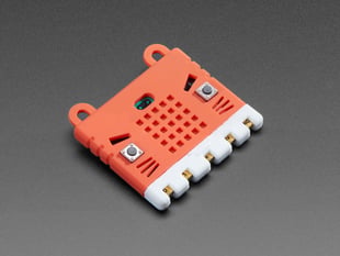 Angled shot of red KittenBot Silicone Sleeve with a board slid in. 
