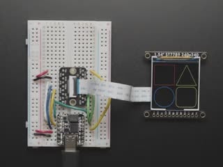 Top Down Demo Video of OLED breakout wired up on breadboard to QT Py and BFF driver board. Video displays multi-colored shapes and animations.