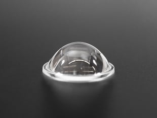 Angled shot of small, circular convex lens.