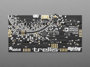 Overhead shot of big, black, rectangle-shaped audio dev board.