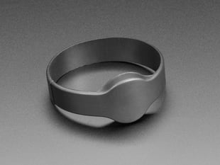 Rubber bracelet with round disc inside