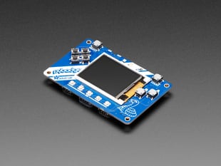 Angled shot of a Adafruit PyBadge for MakeCode Arcade, CircuitPython, or Arduino. 