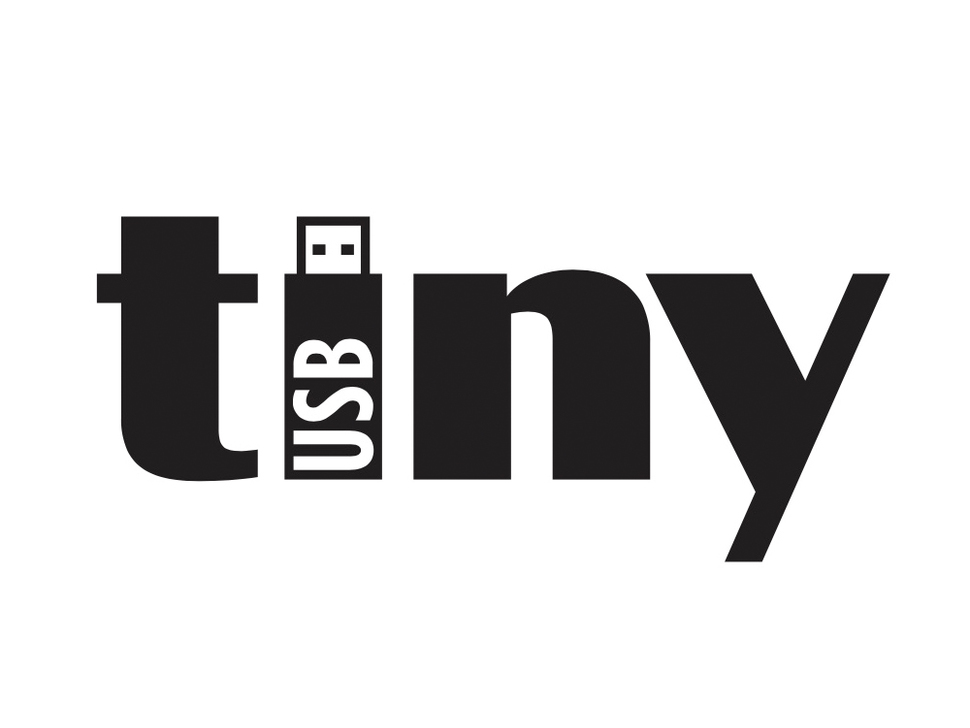 Black and white image of the word "tiny". The "i" is in the shade of a USB stick and read "USB" text on the "i".