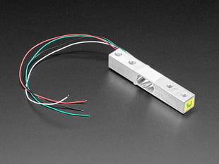 Angled shot of a Strain Gauge Load Cell - 4 Wires - 1Kg.