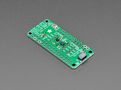 Angled shot of a Adafruit LSM6DSOX + LIS3MDL FeatherWing.