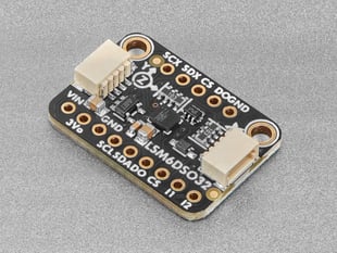 Angled shot of a rectangular accelerometer breakout board.