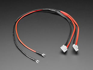 Angled shot of red and black prong power cables.