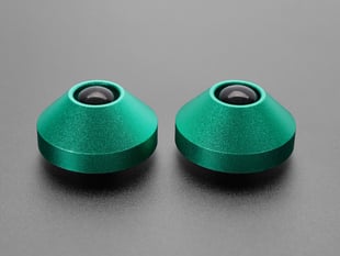 Angled shot of two green aluminum bumper feet.