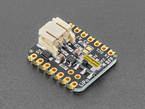 Angled shot of small, black, square-shaped breakout board.