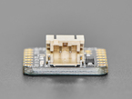 Close-up of JST-PH connector on small, black, square-shaped breakout board.