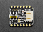 Top view of small, black, square-shaped breakout board.