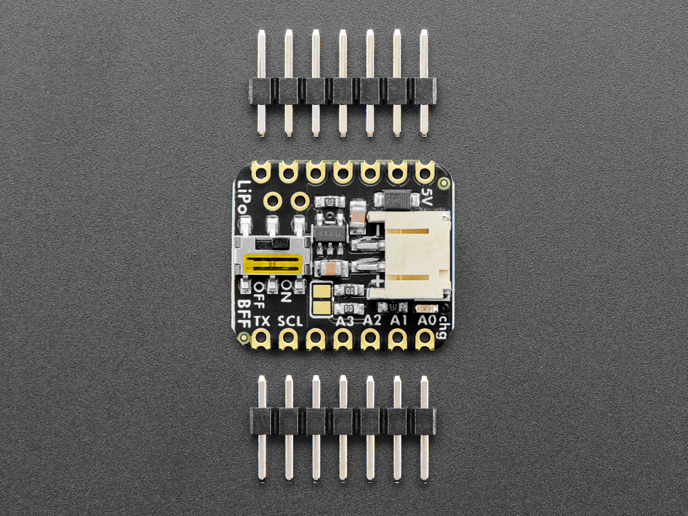small, black, square-shaped breakout board with two 7-pin headers