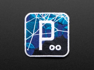 Square embroidered badge with geometric lines over a blue gradient background with a white P in the center, trimmed in white. 