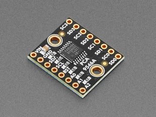 Angled shot of small, black, square I2C multiplexer.