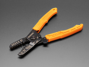 Angled shot of crimping pliers for micro connectors.