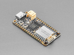 Angled shot of rectangular LoRa radio dev board.