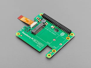 angled shot of green, rectangular add-on board with short FPC ribbon cable.