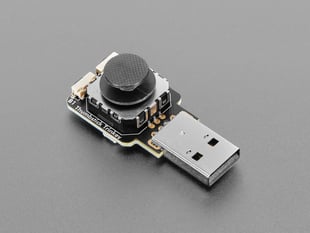 Angled Shot of the Adafruit Thumbstick Trinkey - USB Key with miniature joystick.