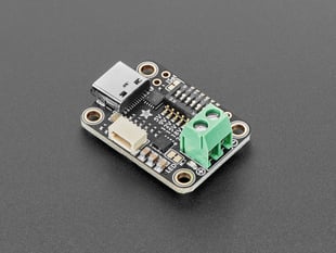 Angled shot of black, rectangular power delivery breakout with a 2-pin terminal block.