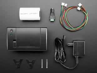 Components included in a Mini Thermal Receipt Printer Starter Pack. 
