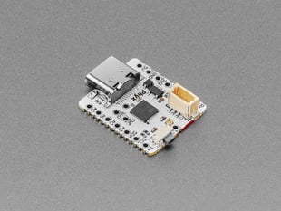 Angled shot of white, square-shaped dev board.