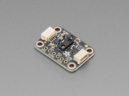 Angled shot of black, rectangular light sensor breakout.