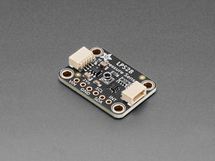 Angled shot of black, rectangular, pressure sensor breakout.